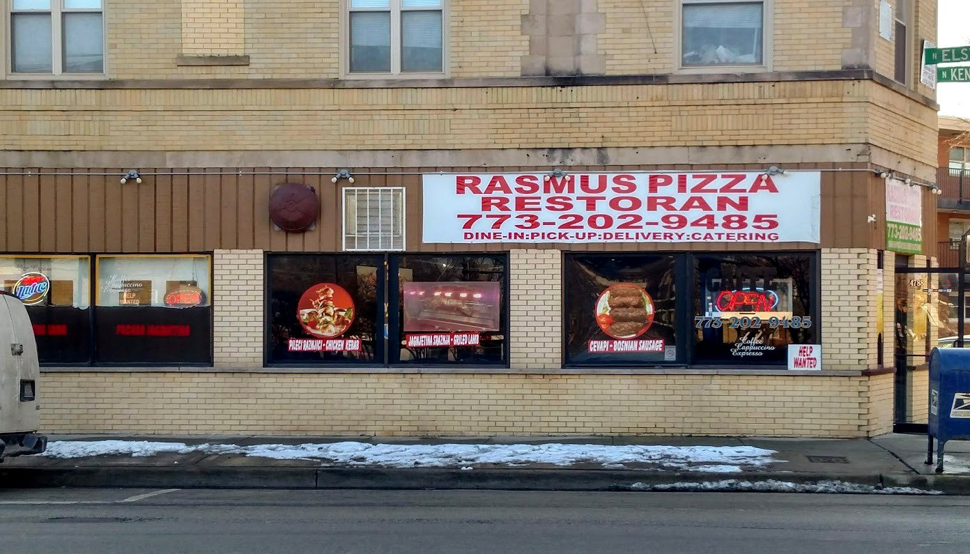 The Rasmus Pizza storefront at Elston and Kenneth in Chicago, with signage